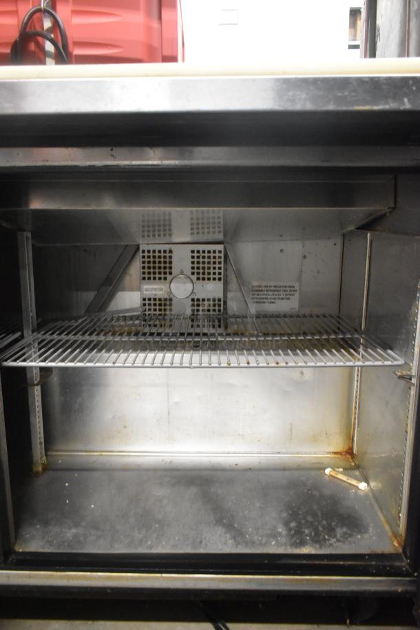 2017 True TSSU-60-10-HC stainless steel prep table with interior shelf, signs of use. 115V, 1 phase.