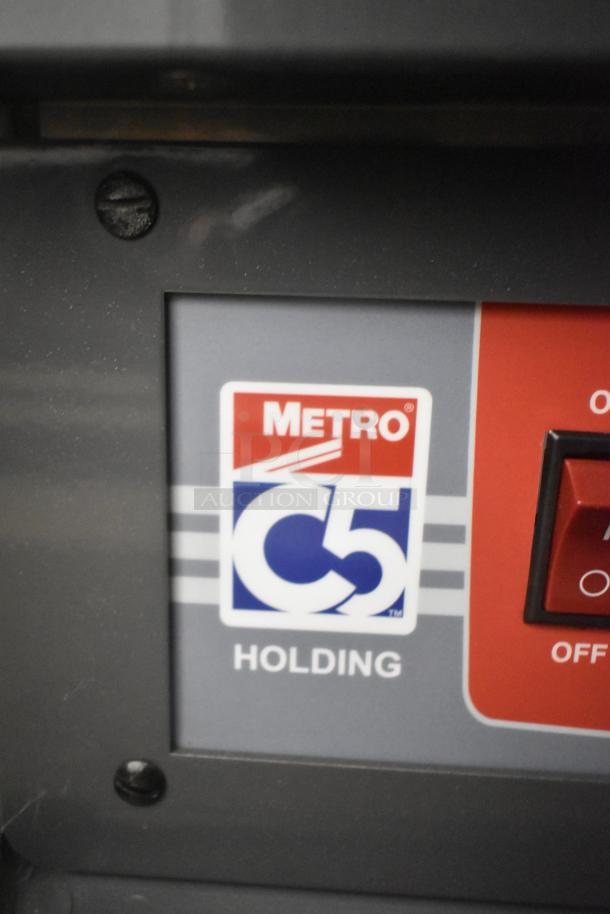Metro C5HME053968 metal commercial insulated heated holding proofer label, showcasing brand and model. 115 volts, 1 phase.