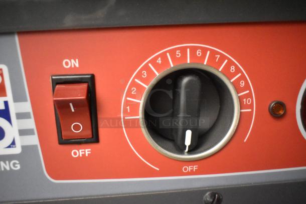 Close-up of control panel on Metro C5HME053968 proofer. Red on/off switch and black dial numbered 1 to 10.