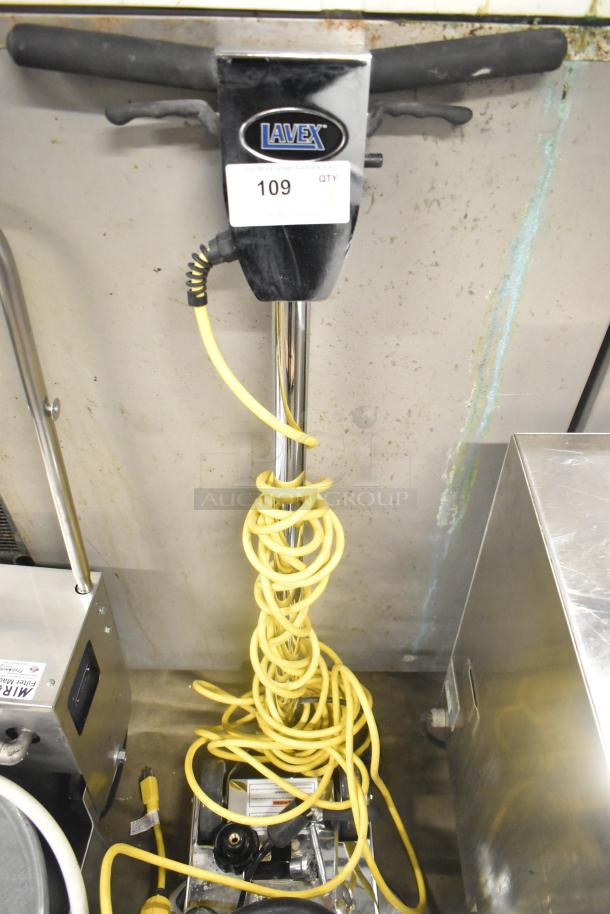 BRAND NEW Lavex Metal Floor Burnisher, 115 Volts, 1 Phase, labeled with "109." Yellow power cord, slight visible wear.
