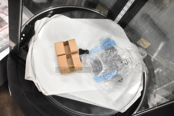 Avantco 193BCR15HCB black circular refrigerated display case, missing glass pane, 110-120V, 1 phase, new condition.