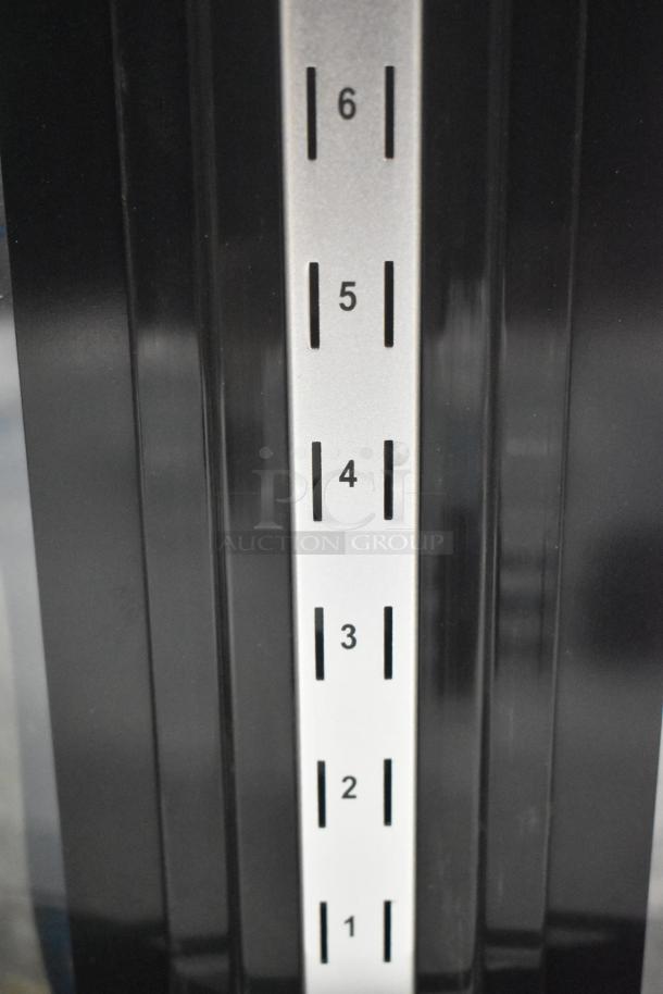 Avantco 193BCR15HCB black refrigerated display case with adjustable shelf levels; missing a glass pane.