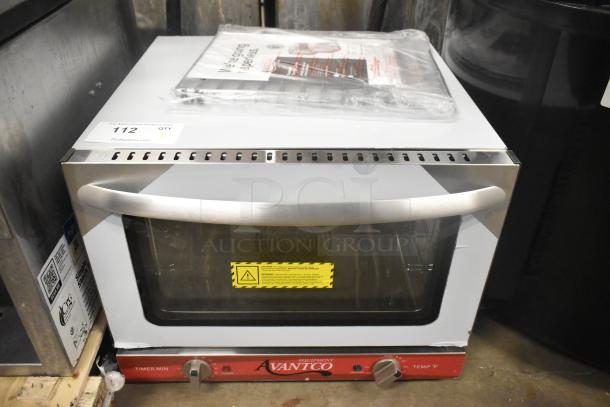 Brand new Avantco 177CO14 stainless steel countertop convection oven, 0.8 Cu. Ft., 120V, with minor scratches and dents.