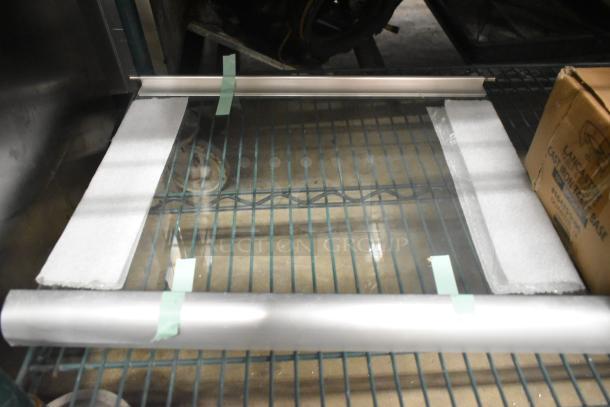 3 new scratch and dent items, including Lancaster Table 164TS1000 cast iron base, glass pane, and gas connector.