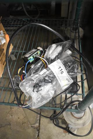 Assorted wires and components on a metal shelf, includes labeled bags, connectors, and a quantity tag indicating "6 Items".