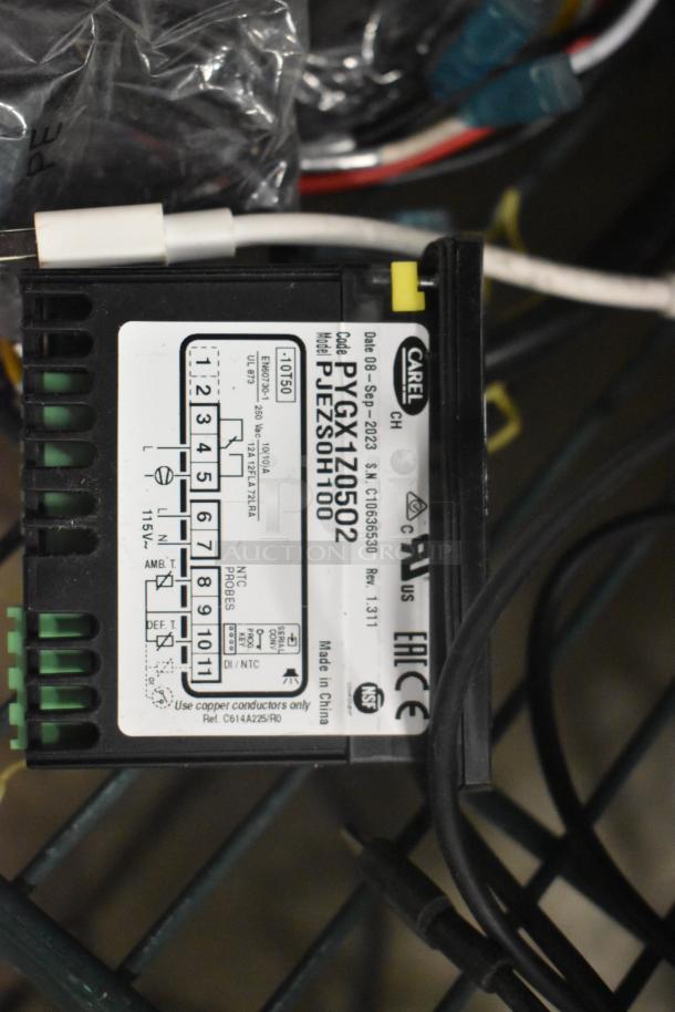 Electronic component, Carel model PJEZSOH100, with wires and labeled specifications, date 08-Sep-2023.