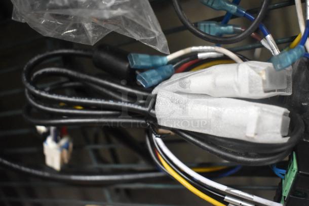 Assorted wires with connectors, bundled together. Includes various colors and types for multiple uses. Good condition.