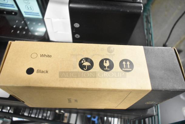 7-item set with Toast cash drawer, Cisco router, Toast Go 2 tablet, TP200 printer, pager system with charger & 19 pagers.