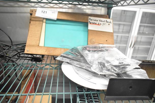 Five items, including Unifin Speaker and Wearson LCD Monitor Stand, on a shelf. Auction lot number 121 visible.