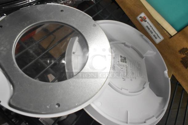 5 various items including a Unifin speaker and Wearson LCD monitor stand. Labels visible, condition appears used.