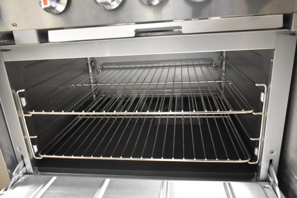BRAND NEW 2025 Cooking Performance Group 351S60N stainless steel oven interior, showing oven racks. Model 351S60N.