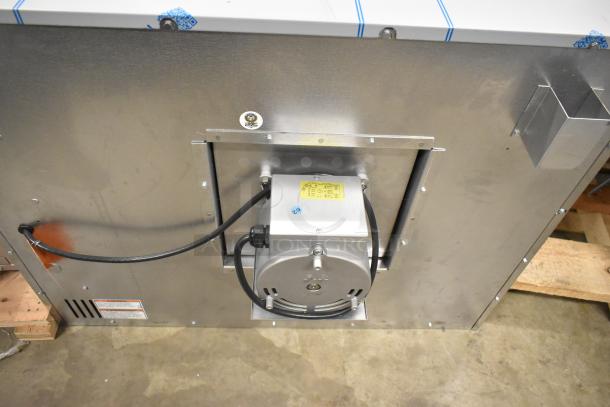 Vulcan VC4ED stainless steel commercial convection oven, new with scratch and dent. Features view-through doors, metal oven racks, thermostatic controls, and 240V power.