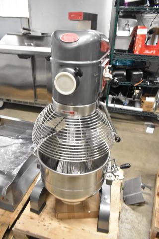 Brand new Avantco 177MX30H metal 30 Qt. commercial planetary floor mixer with mixing bowl, bowl guard, and whisk attachment.