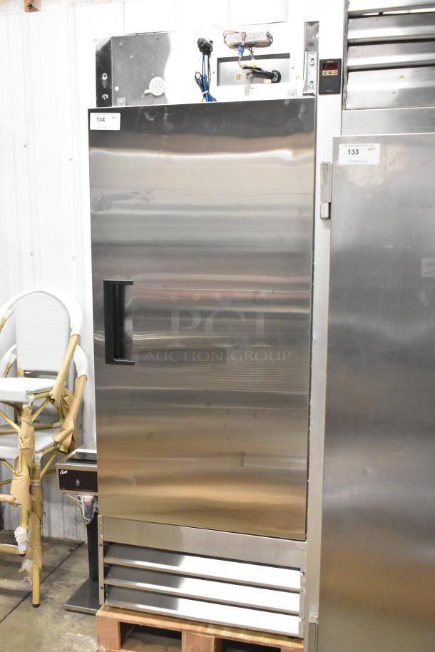 Brand new Avantco 178A19FHC stainless steel single door freezer with poly coated racks, 115V, 1 phase; minor dents visible.