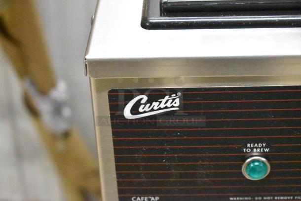Brand new Curtis CAFE0AP10A000 stainless steel airpot coffee brewer, 2.2L, 120V, 1 phase, "ready to brew" indicator.