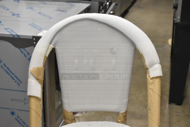 New wooden bar height chair with white backrest and seat, protective packaging, scratch and dent, auction item.