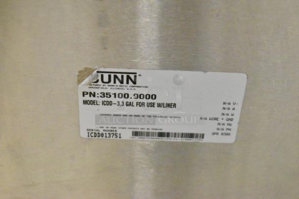 Bunn ICDD-3 stainless steel reservoir stand, model ICDD-3, in good condition with visible label detailing model and serial number.
