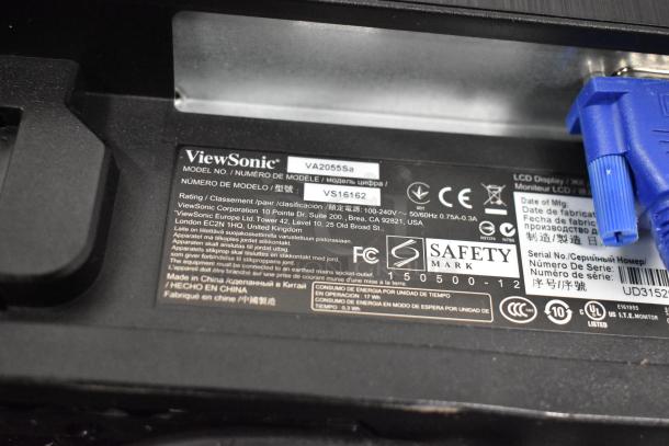 Close-up of ViewSonic monitor label showing model VA2055Sa, safety certifications, and manufacturing details.