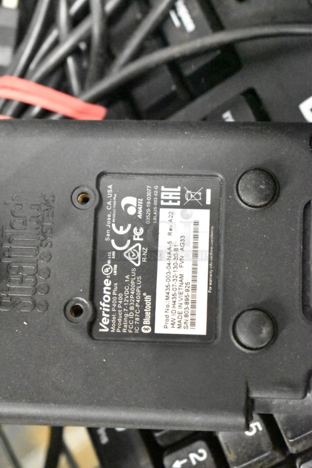 Various electronic items include 5 Epson receipt printers, a metal cash drawer, a computer keyboard, and a monitor with cables.