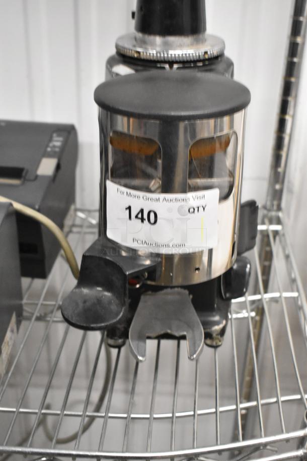 Magister M MD LA metal commercial espresso machine, missing lid. Model label visible. Uses 115 volts, 1 phase.