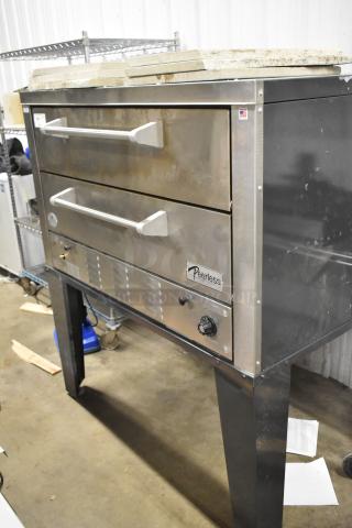 Peerless stainless steel commercial 2-deck pizza oven on metal legs, with sleek design and visible brand label.