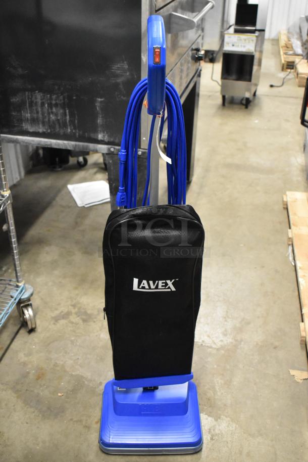 Brand new Lavex 457LWVAC12 12" upright bagged vacuum, 120V, light weight, black with blue accents, minor scratches.