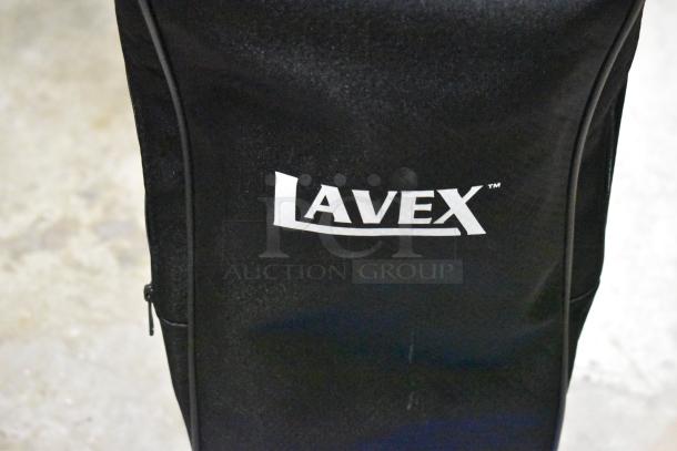 Brand new Lavex 457LWVAC12 12" upright vacuum cleaner, lightweight, bagged, 120V, 1 phase, minor scratches visible.