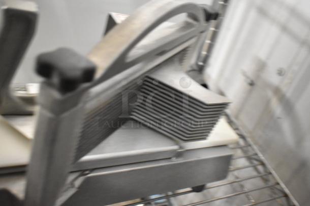 Nemco Metal Commercial Countertop Tomato Slicer, durable metal design, sharp blades, used condition, ideal for kitchens.