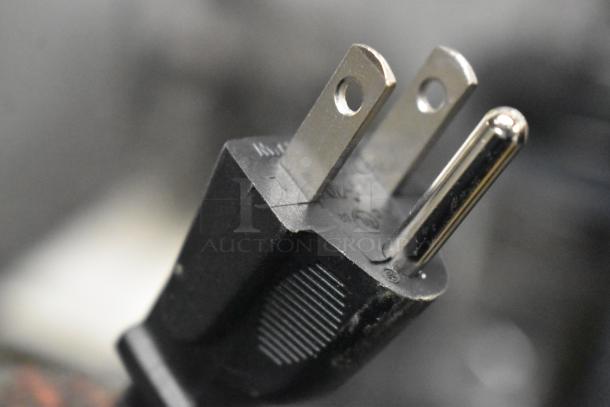 Close-up of an electrical plug for a 2025 AvaMix 928BX1000T commercial blender.