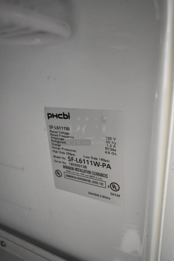PHCbi SF-L6111W stainless steel commercial undercounter freezer label, showing model SF-L6111W-PA, 120V, 60Hz, 1.3A.