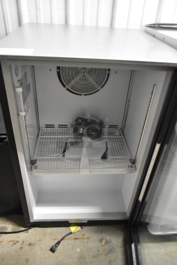 Imbera EVD04 mini cooler merchandiser with an open glass door, interior fan, and wire rack. Clean interior. 115 volts, 1 phase.
