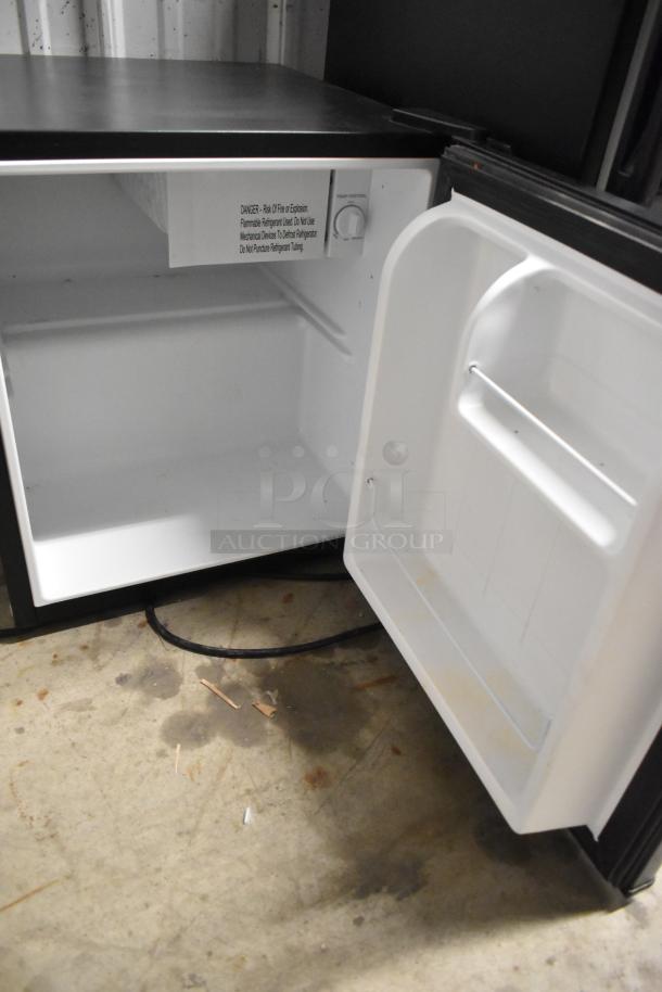 Imbera EVD04 Mini Cooler Merchandiser, 115V, open door view, interior label warning, used condition.