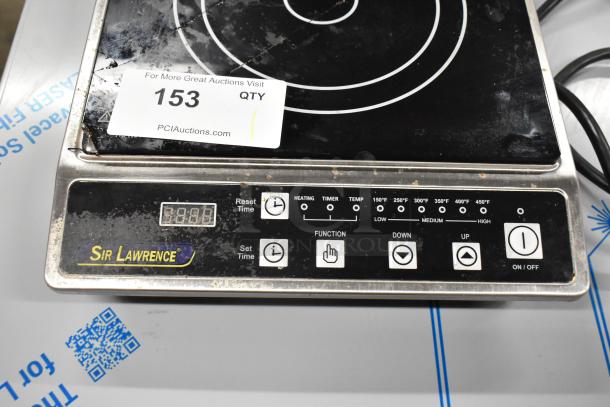 2023 Sir Lawrence SLIN1800 stainless steel induction range with a cracked glass top, 120V, 1 phase. Visible controls and branding.