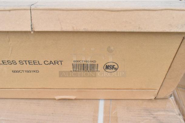 Box labeled "600CT1931KD" with NSF certification, containing a Regency 19" x 30.5" stainless steel utility cart.