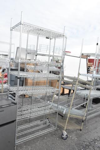 Two wire shelving units for auction. Good condition. Buyer must dismantle. Consider freight charges.
