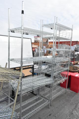 Two chrome finish wire shelving units, multiple tiers, sturdy construction, excellent condition, buyer dismantling required.