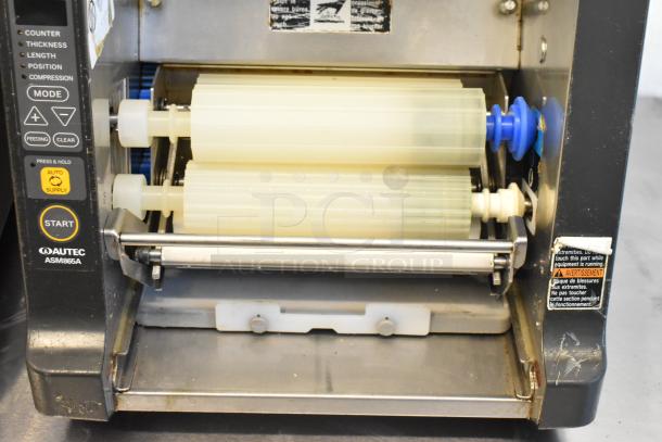 Autec Audio-Technica ASM865A sushi maker in stainless steel, featuring dual rollers. Model tag and warning label visible.