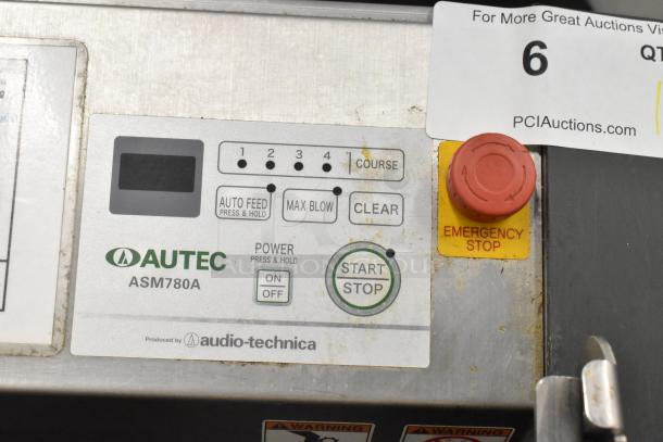 Autec Audio-Technica ASM780A sushi machine panel with power controls, Auto Feed, and Emergency Stop button. Model and branding visible.