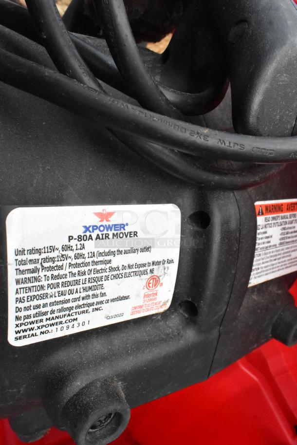 Red Xpower P-80A air mover motor with labels detailing electrical specs. Includes wiring and usage warnings.