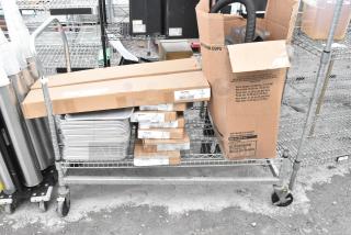 Chrome finish shelving unit with metal baking pans and WST969C divider kits, buyer must dismantle.