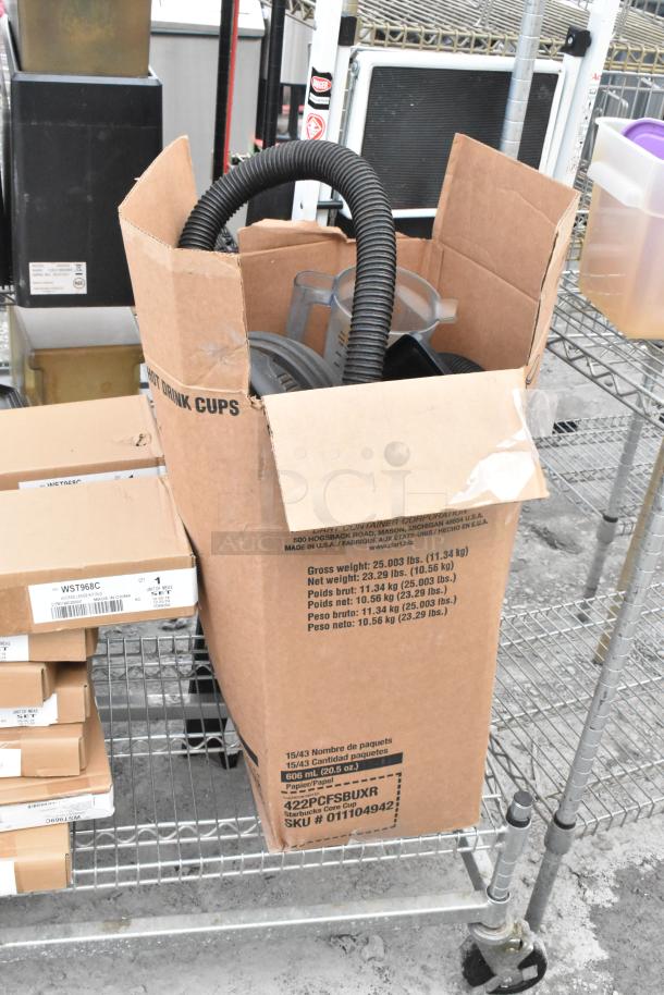 Chrome finish shelving unit with metal baking pans, WST969C divider kits, and assorted contents on wire racks.