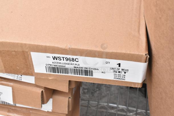 Chrome shelving unit with metal baking pans and WST969C divider kits. Buyer must dismantle; freight charges apply.