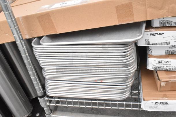 Chrome finish shelving unit with metal baking pans, WST969C divider kits, in used condition. Buyer must dismantle.