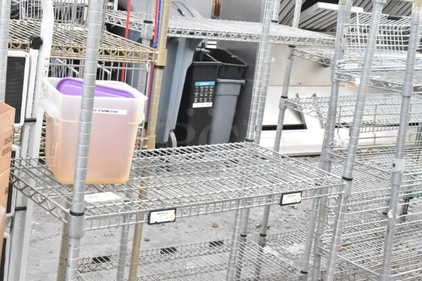 Chrome finish 4-tier shelving unit, sturdy wire construction, in good condition. Buyer must dismantle for shipping.