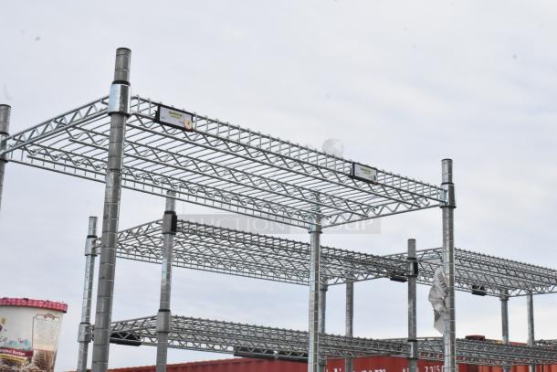 Chrome finish 4-tier shelving unit, metal construction, durable design, visible labels indicating assembly details.