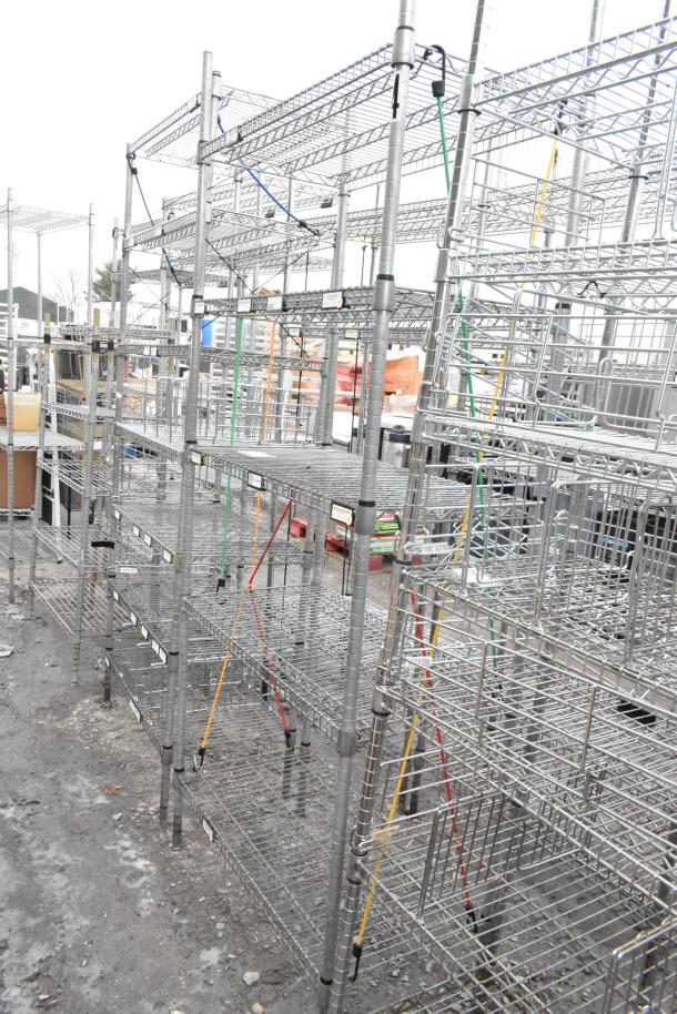 Chrome finish 5 tier shelving unit, disassembled; sturdy wire construction, used condition. Buyer dismantling required.