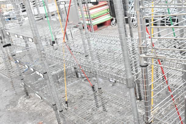 Chrome finish 5-tier shelving unit with metal wire shelves, sturdy construction, buyer dismantles, freight charges apply.