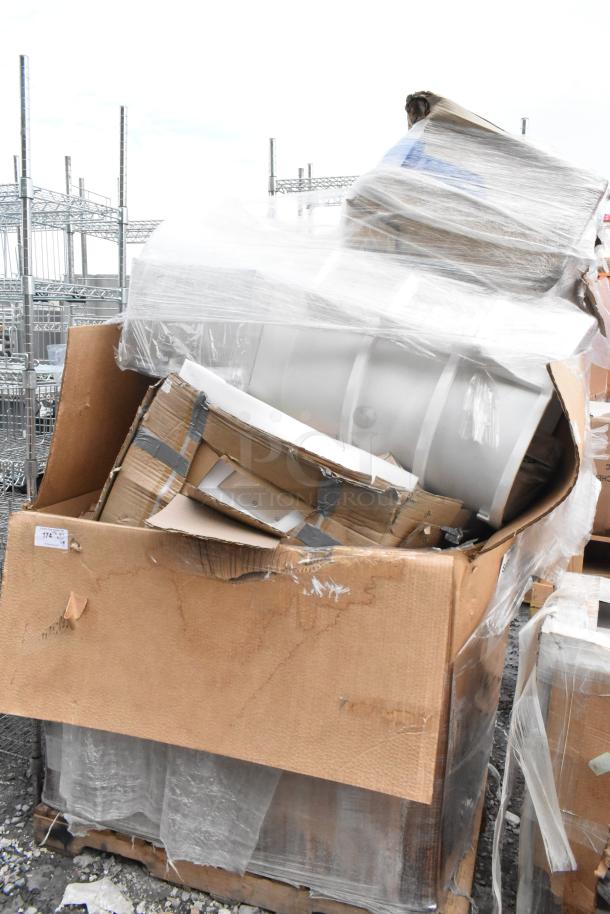 12 brand new scratch and dent items in a large cardboard box, including Regency stainless steel liquor racks and white poly trash cans.