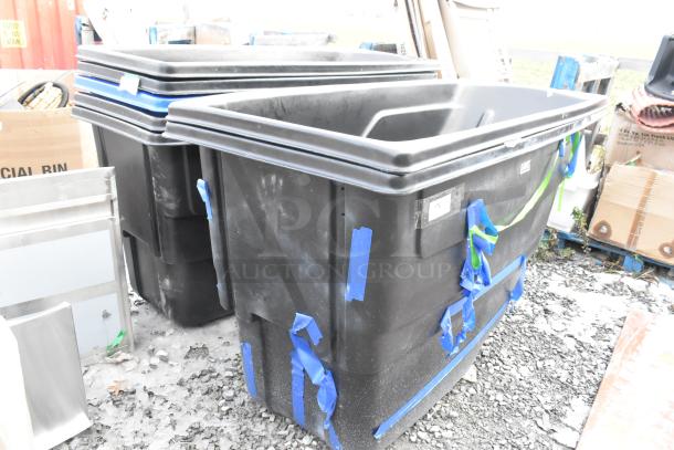 Brand new black poly tilt trucks with scratch and dent condition, features blue protective tape. Auction for 7 units.