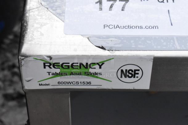 Regency 600WCS1536 stainless steel wall cabinet label, NSF certified, showing model number. Missing one sliding door.